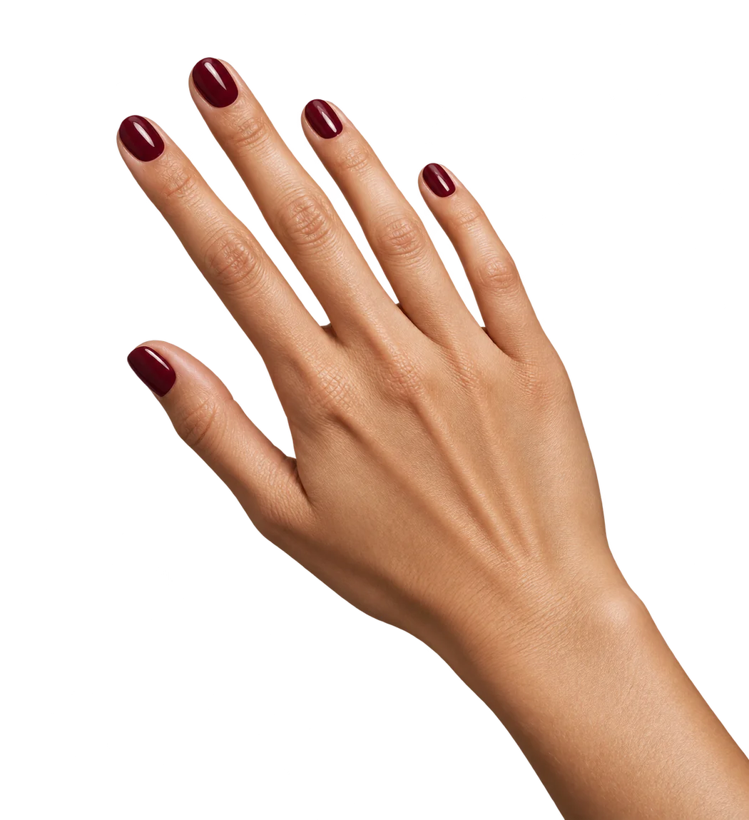Main aux ongles vernis, photographie illustrative